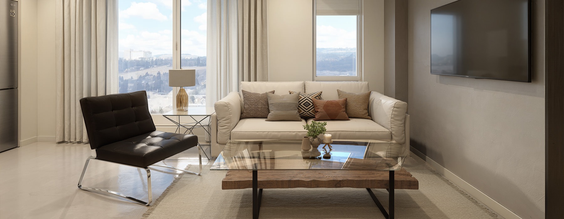 a living room with a tv and a couch
