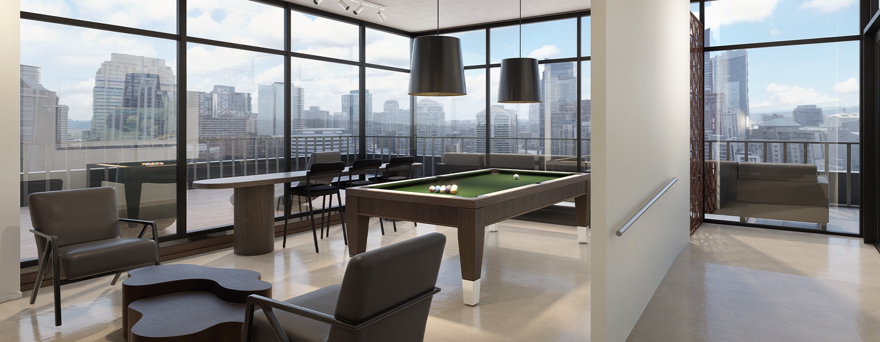 a room with a pool table and chairs