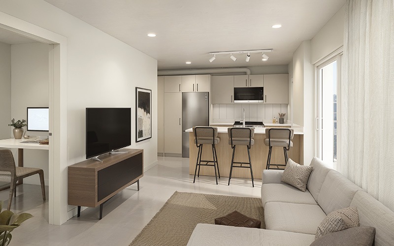 living room with furniture tv and view of a kitchen